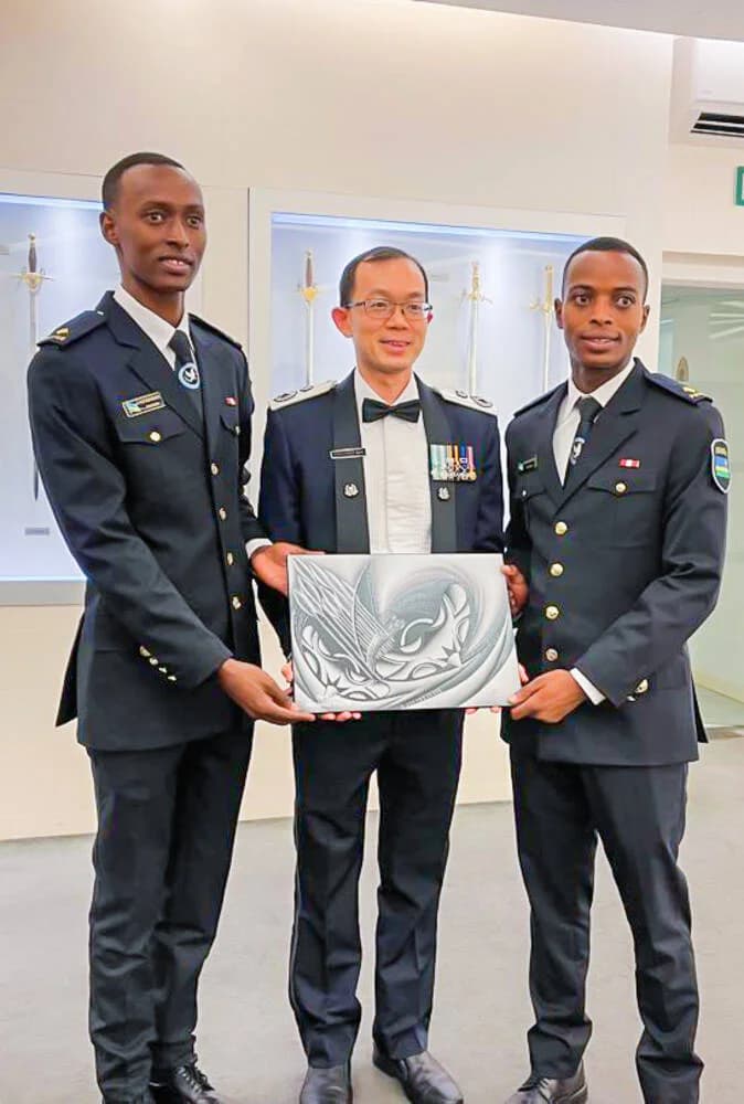 Two Rwandan Police officers graduate from Singapore Police Training Command