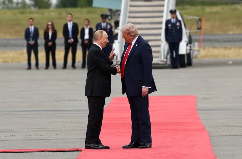 Photos: Trump and Putin exchange 'historic handshake' in Alaska