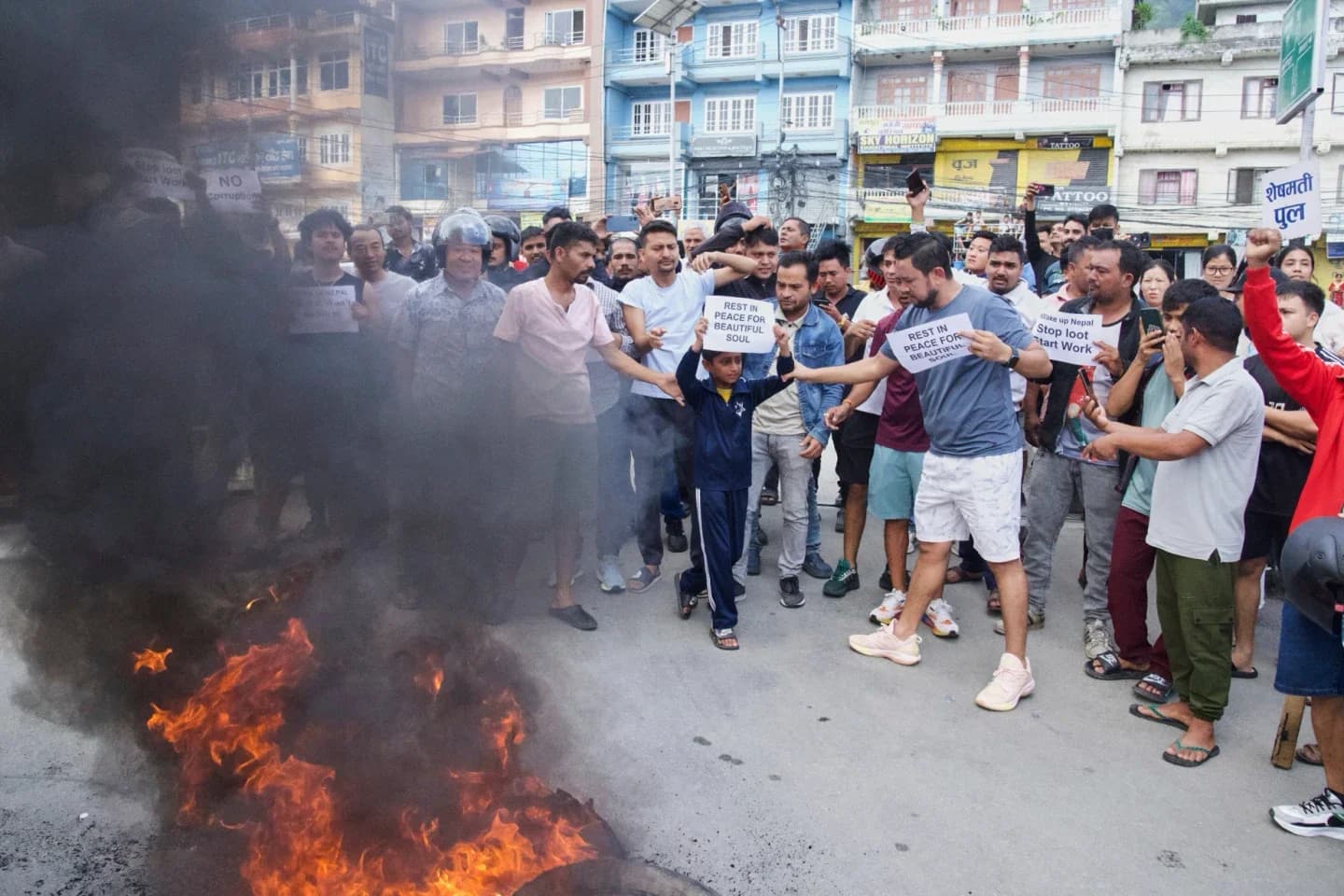 Protesters torch homes of Nepal’s top leaders as social media ban is lifted; curfew imposed after 19 killed