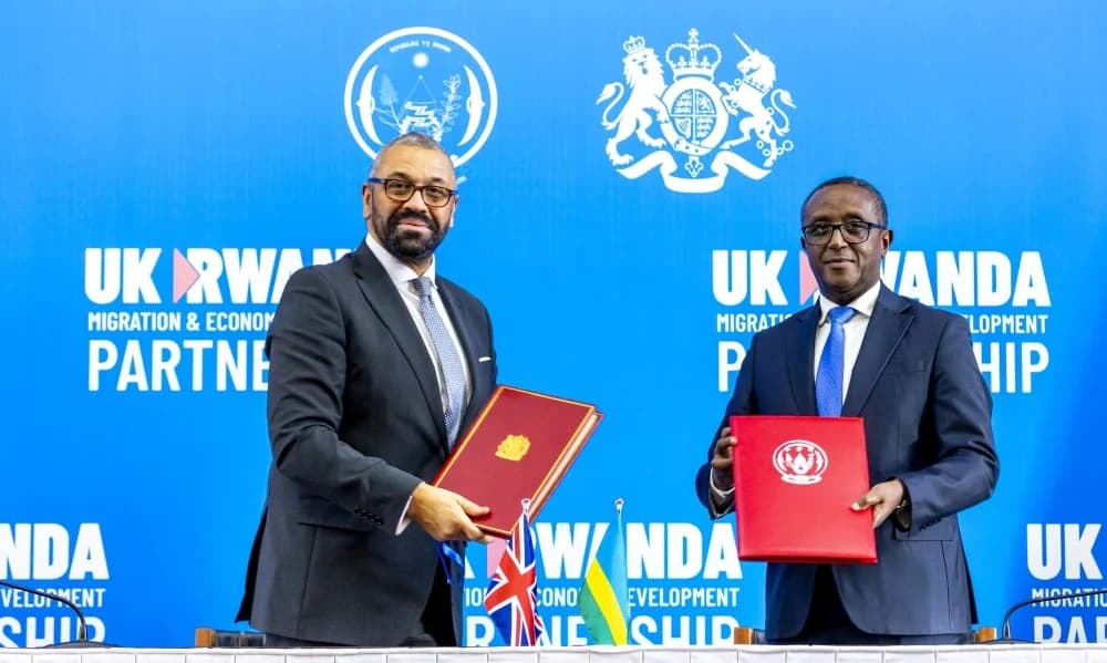 Former foreign affairs minister Vincent Biruta (right) poses for a photo with James Cleverly, former UK home secretary after signing the MEDP in 2023.