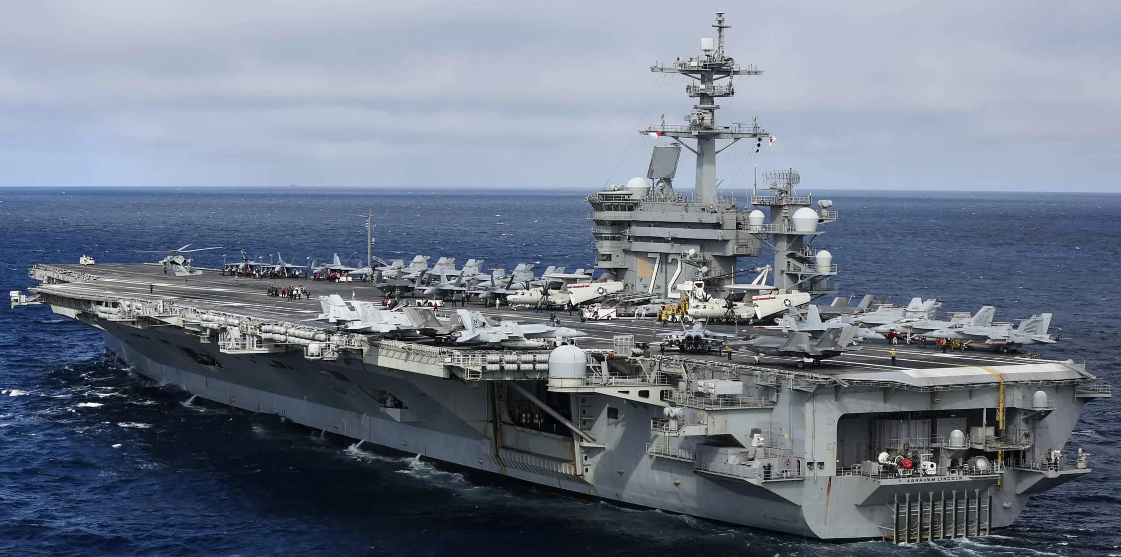A generic image of USS Abraham Lincoln, a Nimitz‑class aircraft carrier. Iran claims it fired missiles at the ship in the Persian Gulf, but the U.S. military says the vessel was not hit.