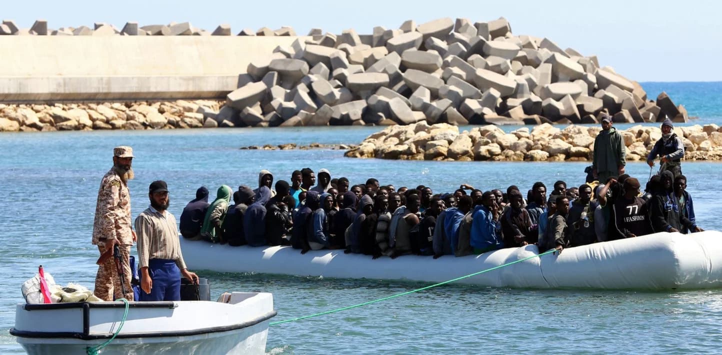 Faces Mounting Pressure Over Libya Migration Deal